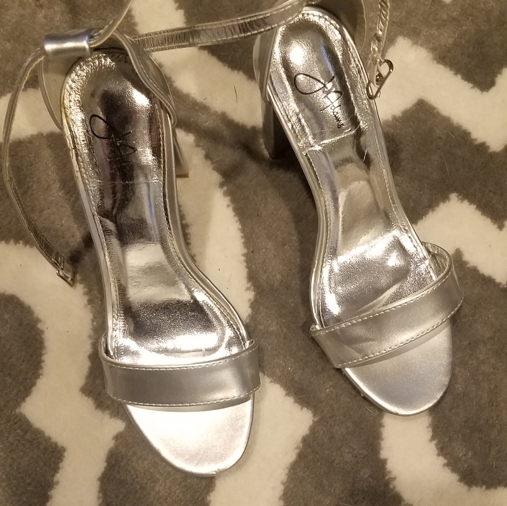 Silver heels never worn